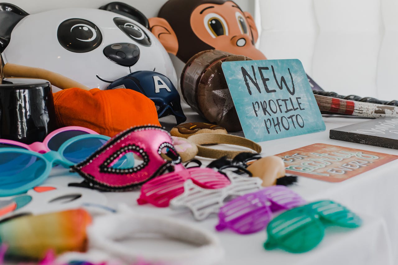 A vibrant array of photobooth props including masks, hats, and signs for lively image captures.